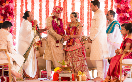 A beautiful couple posing for a wedding photoshoot at Prathamesh Resort, surrounded by scenic nature.